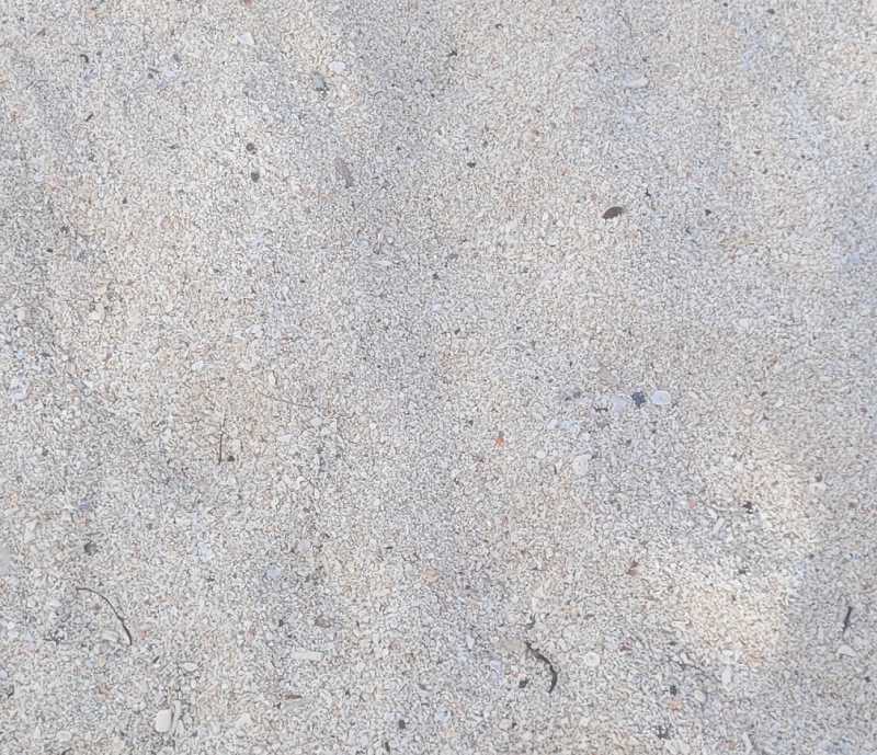 Coarse sand towards the edges of Sunrise Beach