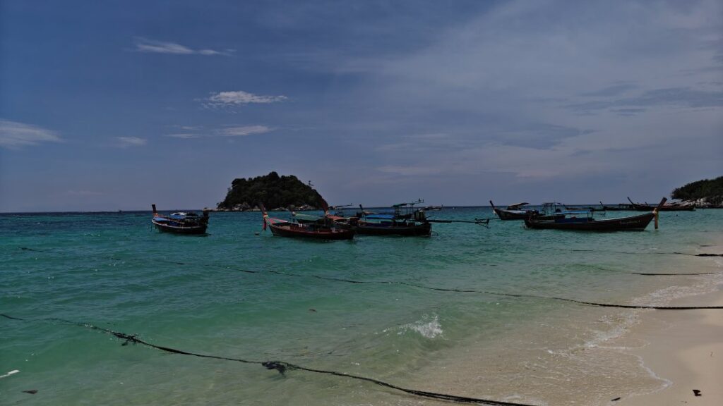 Longtail boats outside Anda Resort Koh Lipe 